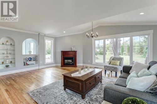 244 Main Road, Green'S Harbour, NL - Indoor Photo Showing Living Room With Fireplace