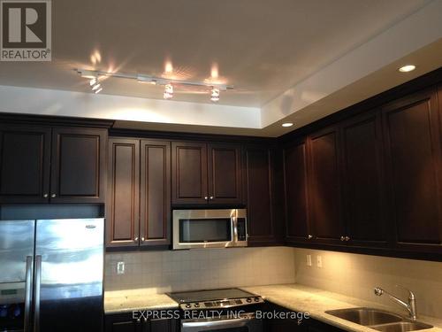 1405 - 21 Grand Magazine Street, Toronto (Niagara), ON - Indoor Photo Showing Kitchen With Double Sink