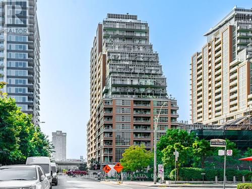 711 - 65 East Liberty Street, Toronto (Niagara), ON - Outdoor With Balcony With Facade