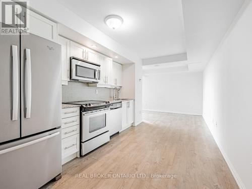 711 - 65 East Liberty Street, Toronto (Niagara), ON - Indoor Photo Showing Kitchen