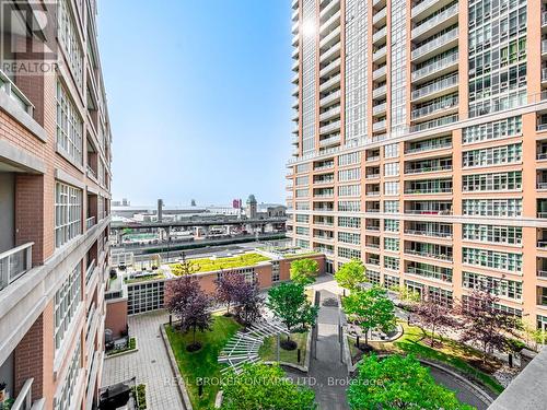 711 - 65 East Liberty Street, Toronto (Niagara), ON - Outdoor With Balcony With Facade