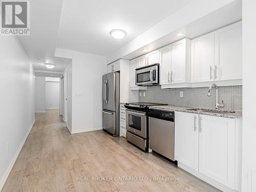 711 - 65 East Liberty Street, Toronto (Niagara), ON - Indoor Photo Showing Kitchen With Stainless Steel Kitchen