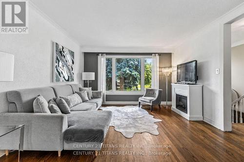 18 Panama Court S, Toronto, ON - Indoor Photo Showing Living Room With Fireplace