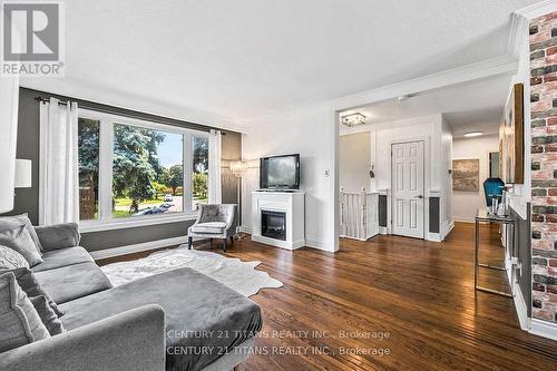 18 Panama Court S, Toronto, ON - Indoor Photo Showing Living Room With Fireplace