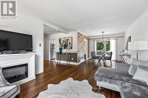 18 Panama Court S, Toronto, ON - Indoor Photo Showing Living Room With Fireplace