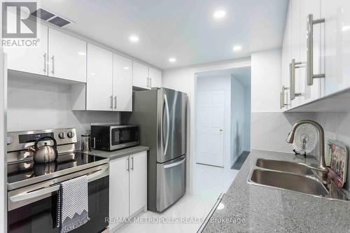 808 - 3151 Bridletowne Circle, Toronto (L'Amoreaux), ON - Indoor Photo Showing Kitchen With Stainless Steel Kitchen With Double Sink With Upgraded Kitchen