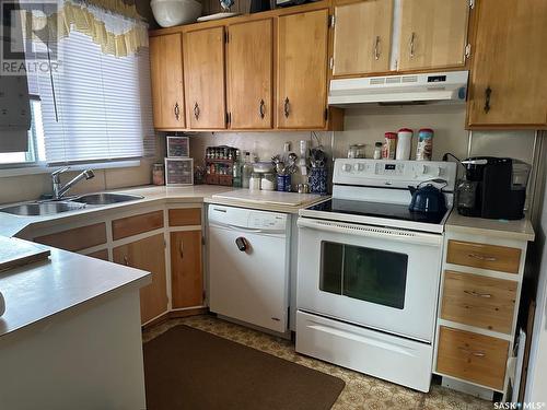 1611 Lawton Crescent, La Ronge, SK - Indoor Photo Showing Kitchen With Double Sink