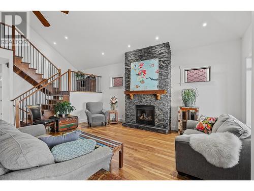 750 Marin Crescent, Kelowna, BC - Indoor Photo Showing Living Room With Fireplace