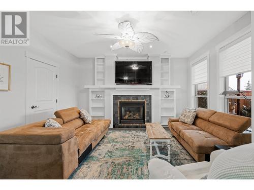 750 Marin Crescent, Kelowna, BC - Indoor Photo Showing Living Room With Fireplace