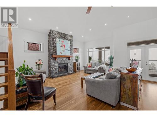 750 Marin Crescent, Kelowna, BC - Indoor Photo Showing Living Room With Fireplace