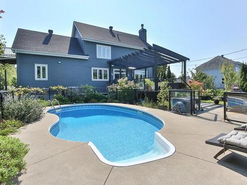 Vue d'ensemble - 129 Rue Des Pruches, Saint-Jean-Sur-Richelieu, QC - Outdoor With In Ground Pool With Deck Patio Veranda