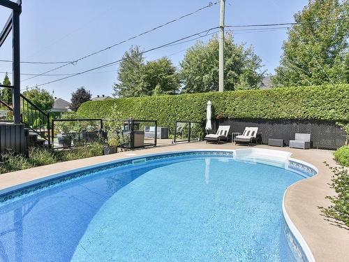 Pool - 129 Rue Des Pruches, Saint-Jean-Sur-Richelieu, QC - Outdoor With In Ground Pool With Backyard