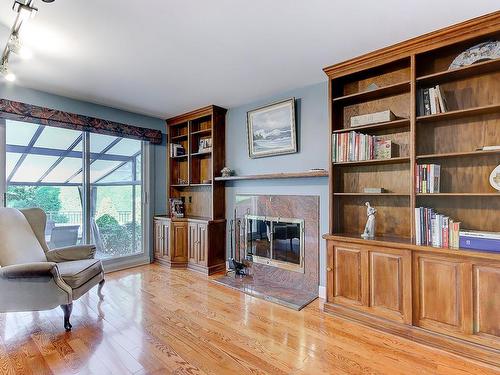 Family room - 155 Place Champoux, Saint-Bruno-De-Montarville, QC - Indoor Photo Showing Other Room With Fireplace