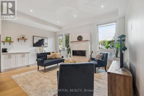 85B Westbourne Avenue, Toronto (Clairlea-Birchmount), ON - Indoor Photo Showing Living Room With Fireplace