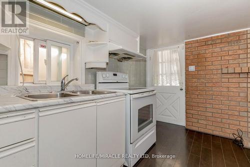 Lower - 158 Gilbert Avenue, Toronto (Corso Italia-Davenport), ON - Indoor Photo Showing Kitchen With Double Sink