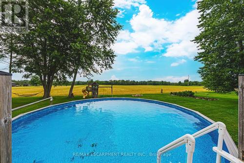 1451 Concession 6 Road W, Hamilton, ON - Outdoor With Above Ground Pool With Backyard