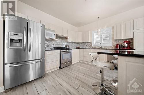 Stainless steel appliances and Quartz countertops. - 87 Shirley'S Brook Drive, Ottawa, ON - Indoor Photo Showing Kitchen With Upgraded Kitchen