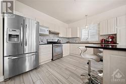 Stainless steel appliances and Quartz countertops. - 