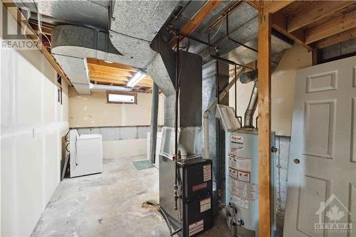 Gas heat, rented hot water tank - 127 Woodbury Crescent, Ottawa, ON - Indoor Photo Showing Basement