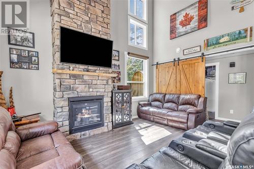 102 Moore Drive, Christopher Lake, SK - Indoor Photo Showing Living Room With Fireplace