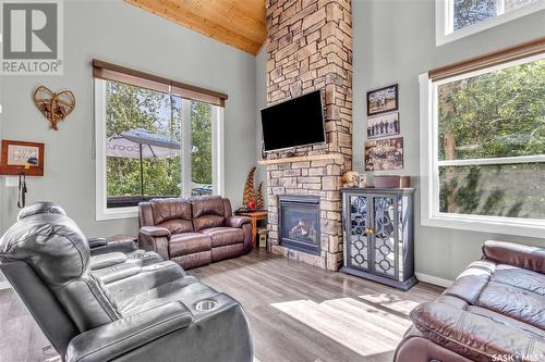 102 Moore Drive, Christopher Lake, SK - Indoor Photo Showing Living Room With Fireplace