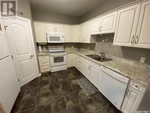 104 123 Balmoral Street, Yorkton, SK - Indoor Photo Showing Kitchen With Double Sink