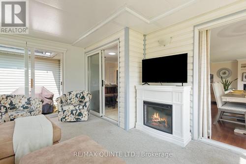 50 Elmdale Drive, Prince Edward County (Wellington), ON - Indoor Photo Showing Living Room With Fireplace