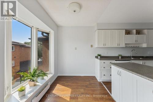 310 - 2183 Walker Avenue, Peterborough (Ashburnham), ON - Indoor Photo Showing Kitchen With Double Sink