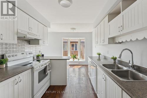 310 - 2183 Walker Avenue, Peterborough (Ashburnham), ON - Indoor Photo Showing Kitchen With Double Sink