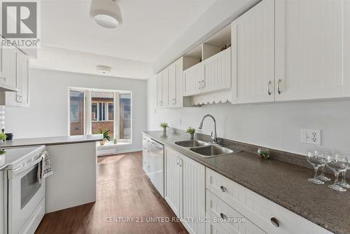 310 - 2183 Walker Avenue, Peterborough (Ashburnham), ON - Indoor Photo Showing Kitchen With Double Sink