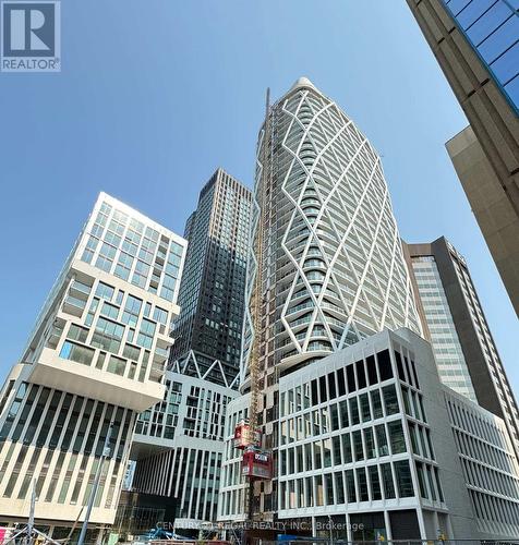 402 - 238 Simcoe Street, Toronto (Kensington-Chinatown), ON - Outdoor With Facade