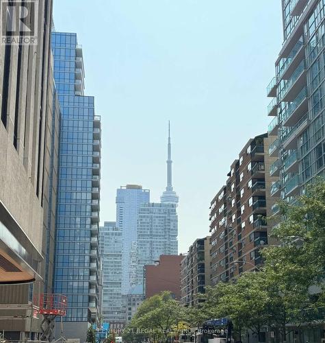 402 - 238 Simcoe Street, Toronto (Kensington-Chinatown), ON - Outdoor With Facade