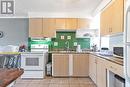 Upper - 555 Kennedy Road, Toronto (Kennedy Park), ON  - Indoor Photo Showing Kitchen With Double Sink 