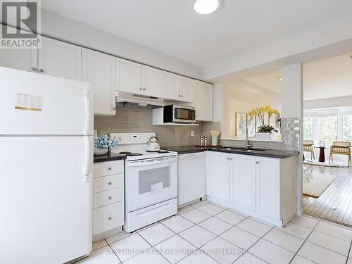 9504 Sheppard Avenue E, Toronto, ON - Indoor Photo Showing Kitchen With Double Sink