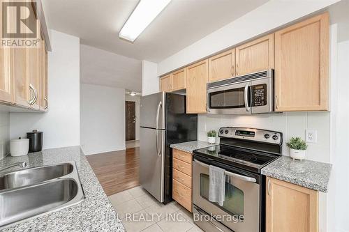 1703 - 4850 Glen Erin Drive, Mississauga (Central Erin Mills), ON - Indoor Photo Showing Kitchen With Double Sink