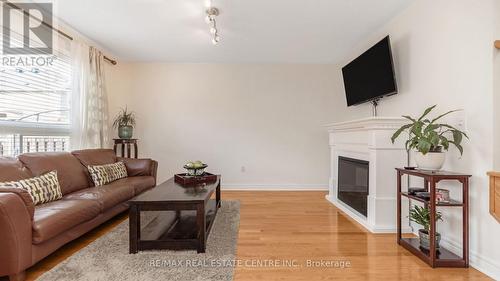 28 Slessor Lane, Brampton (Bram East), ON - Indoor Photo Showing Living Room With Fireplace