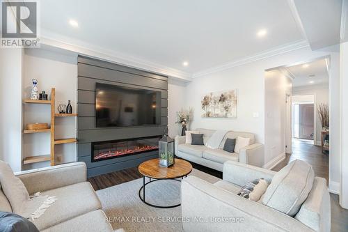 74 Donnan Drive, New Tecumseth, ON - Indoor Photo Showing Living Room With Fireplace