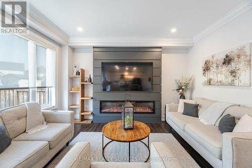 74 Donnan Drive, New Tecumseth, ON - Indoor Photo Showing Living Room With Fireplace