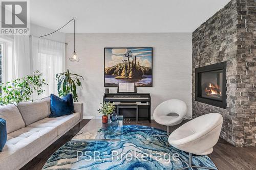 13 Mulberry Court, Barrie (Innis-Shore), ON - Indoor Photo Showing Living Room With Fireplace