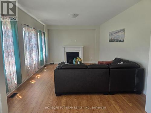 220 Warden Street, Clearview (Stayner), ON - Indoor Photo Showing Living Room With Fireplace