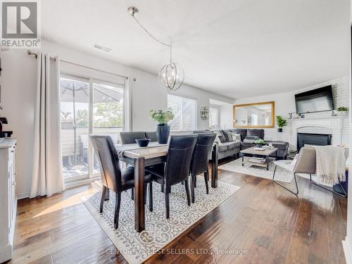 92 - 2530 Northampton Boulevard, Burlington, ON - Indoor Photo Showing Dining Room With Fireplace