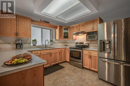 373 Rio Drive S, Kelowna, BC - Indoor Photo Showing Kitchen With Double Sink