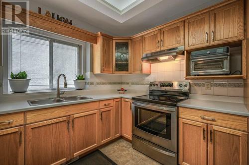 373 Rio Drive S, Kelowna, BC - Indoor Photo Showing Kitchen With Double Sink