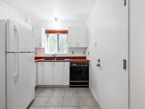 Cuisine - 301-8900 Boul. Rivard, Brossard, QC - Indoor Photo Showing Kitchen With Double Sink