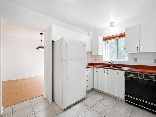 Cuisine - 301-8900 Boul. Rivard, Brossard, QC - Indoor Photo Showing Kitchen With Double Sink