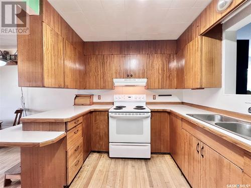 218 Simpson Street, Outlook, SK - Indoor Photo Showing Kitchen With Double Sink