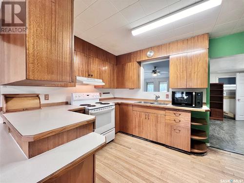 218 Simpson Street, Outlook, SK - Indoor Photo Showing Kitchen With Double Sink