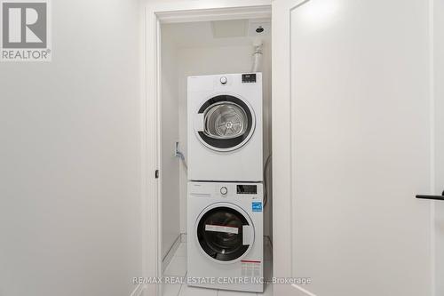 210 - 123 Portland Street, Toronto, ON - Indoor Photo Showing Laundry Room