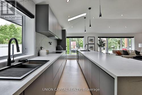 22 Mcarthur Street, Toronto, ON - Indoor Photo Showing Kitchen With Double Sink