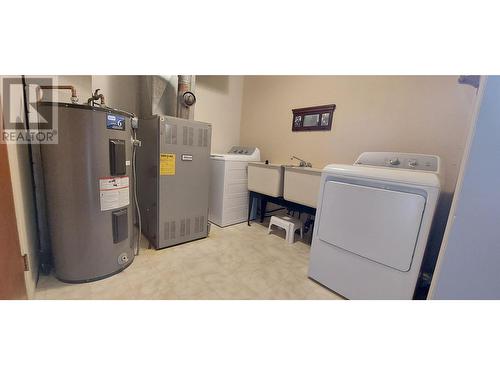 1956 Mackenzie Highway, Hagensborg, BC - Indoor Photo Showing Laundry Room